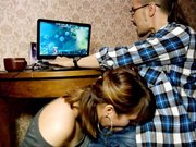 Boyfriend playing games is surprised with a blowjob from girlfriend