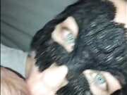 Masked female partner with green eyes sucking penis and getting a facial
