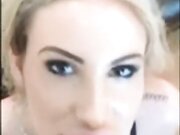 Promiscuous looking blonde with big Botox lips receives sperm on her plastic face