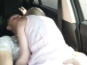 Sexually Aroused couple doing risky sexual intercourse and oral sex in car in public traffic